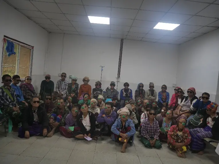 Karen community members gathered during an eye-care mission